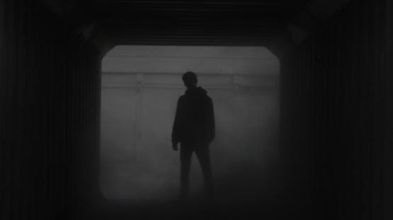 a man in the shadows