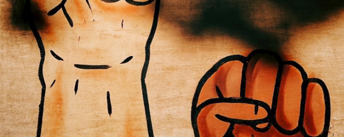 Drawing of two brandished fists 