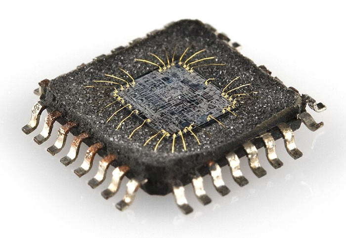 A delidded chip, exposing the microprocessor inside